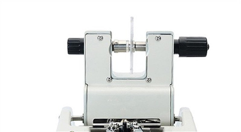 Metal lens clamp